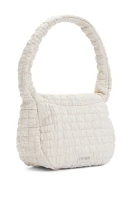 Shoulder bag in quilted-effect faux leather