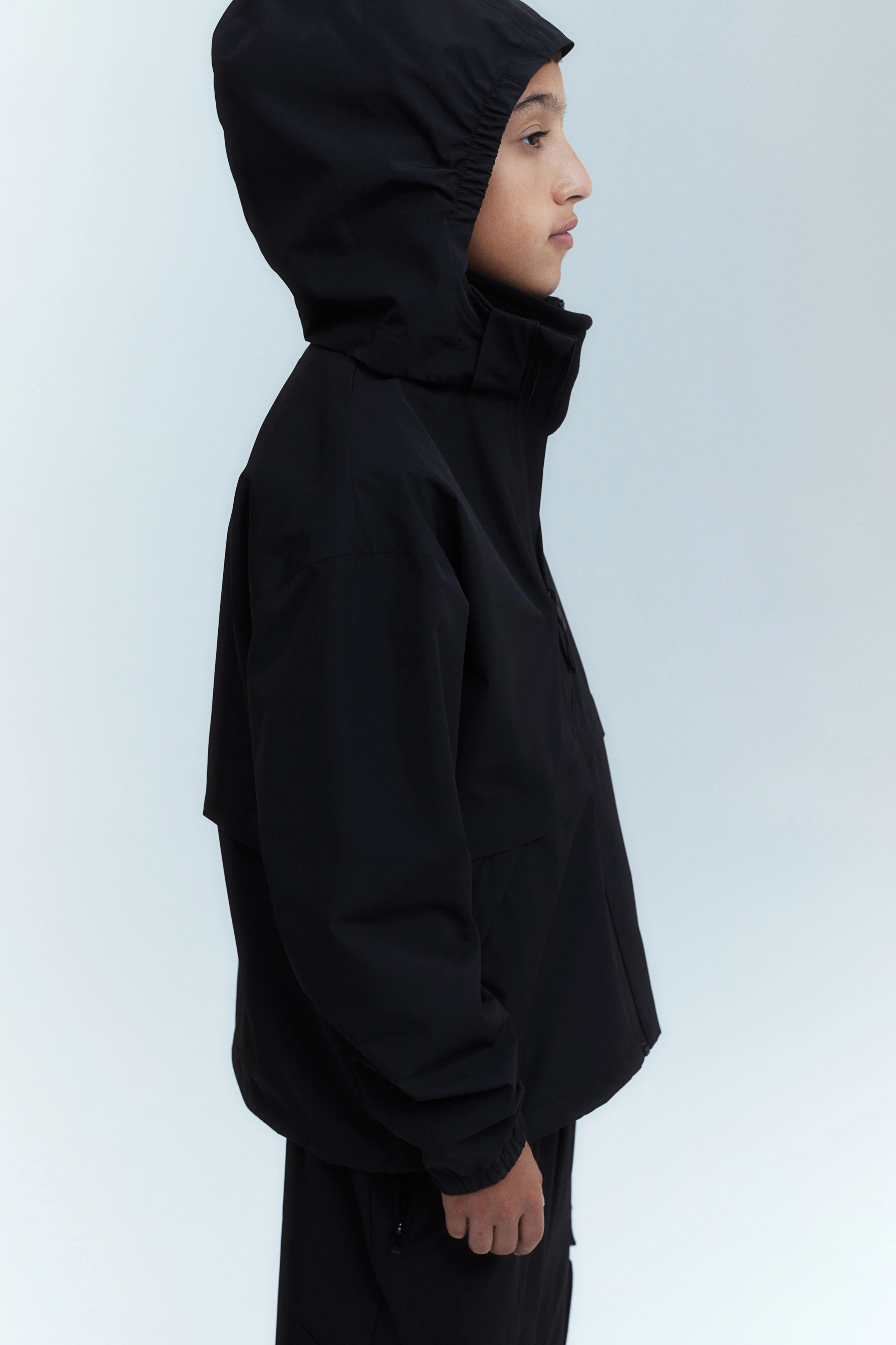 StormMove™ Rain jacket - Long sleeve - Regular length - Black - Kids | H&M GB