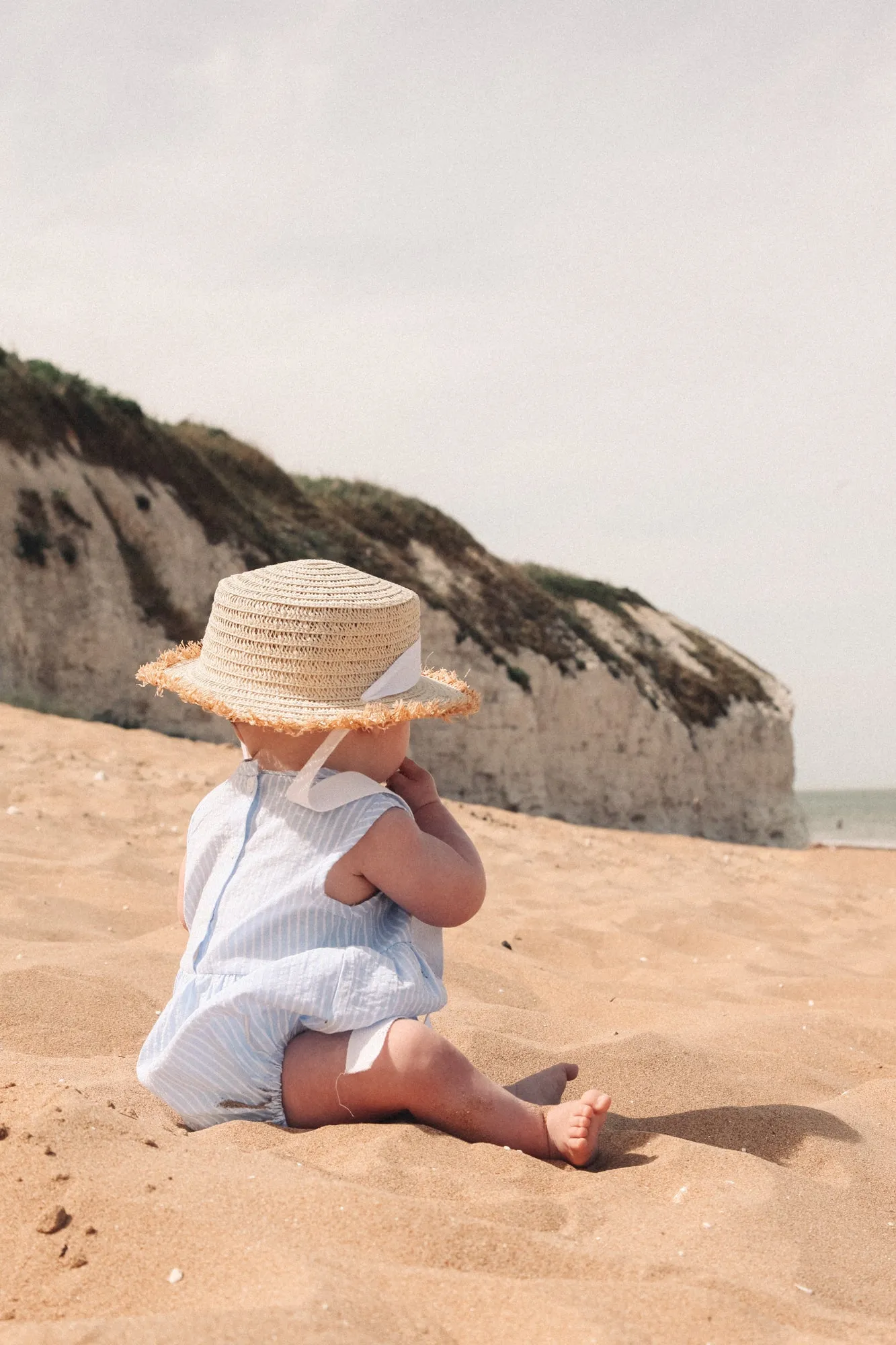 Straw Hat With White Cotton Ties