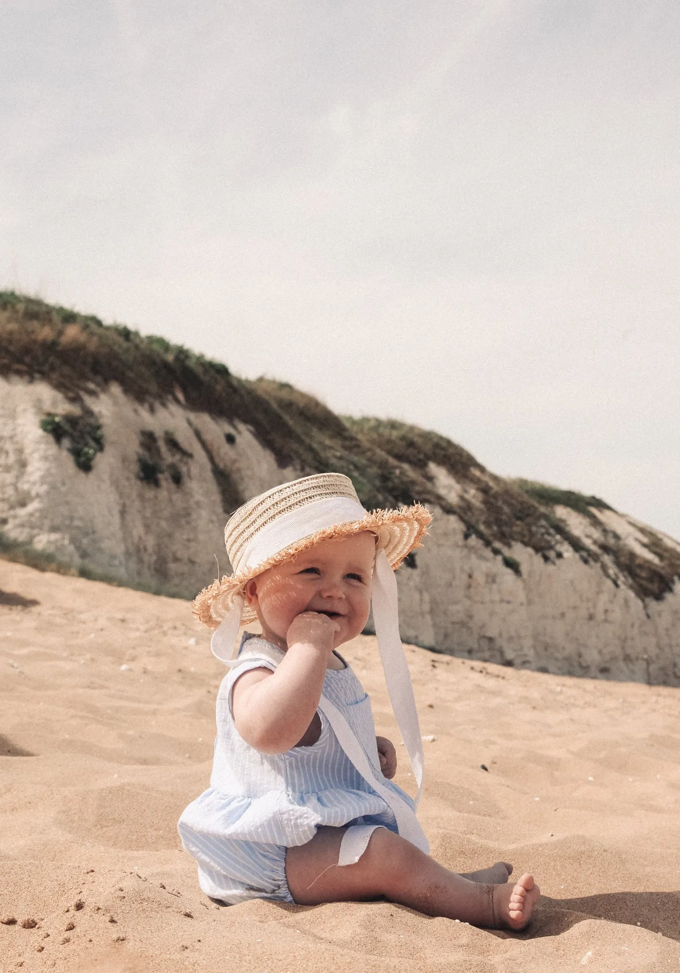 Straw Hat With White Cotton Ties