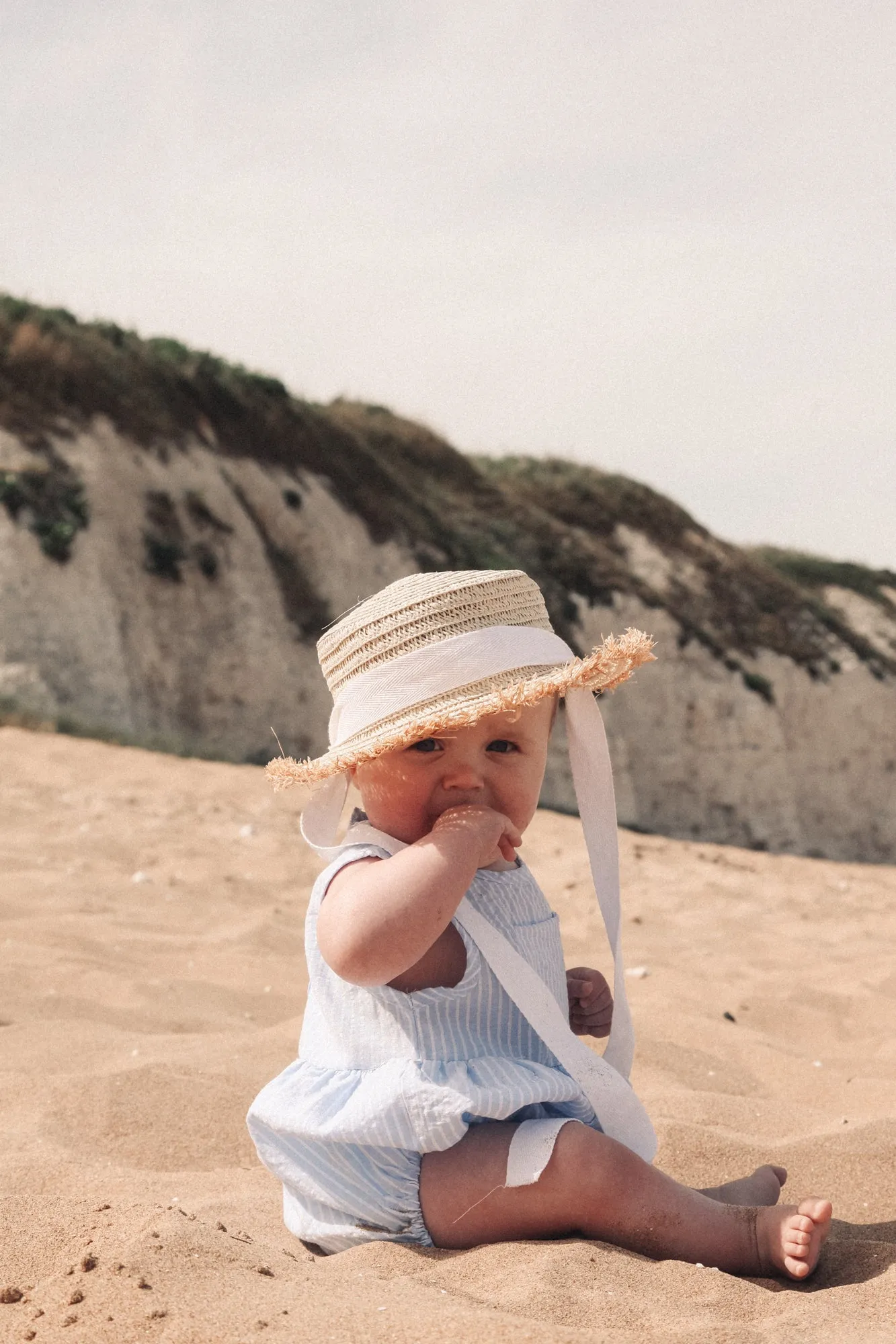 Straw Hat With White Cotton Ties